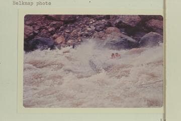 The "Triangle" in Vulcan Rapid as the boat returned to the water after jumping off the top of the first wave. It was swung with the port beam on and tossed into the air to barely escape capsizing. Jim Bechtel is driving and Bob Valentine riding