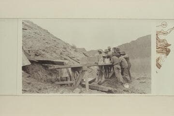 Watching the clean-up at the Camp Ibex plant of Charles H. Spencer
