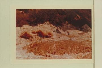 Buzz Belknap piloting the "Bootoo" through Vulcan Rapid