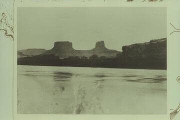 19. On the Green River, No Identification. Brown-Stanton party. The Buttes of the Cross from the left bank of Green River at about Mile 30. Townsite or Anderson Bottom is the low land across the river