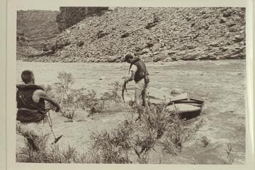 Jack and Walt lining around Government Rapid.  The "Black Submarine" was lined but Don Wimpress ran the rapid in the "Argo."