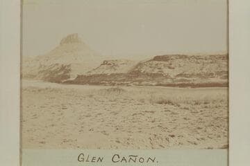 Castle Butte, left bank, mile 151, Glen Canyon. "Glen Canon. Upper rock, except one butte, eroded and gone several miles back from the river."