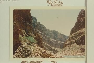 Downriver at Olo Canyon.  There is a cairn or granary at right of where creek falls into pool