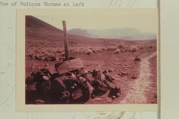 Lava Falls Trail sign.  Toe of Vulcans Throne at left