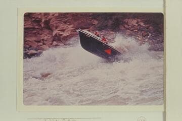 The "Triangle" topping the first wave in Vulcan Rapid with Jim Bechtel driving and Bob Valentine riding. The course chosen is too far to the right and the control of the boat has been lost at the point of this picture