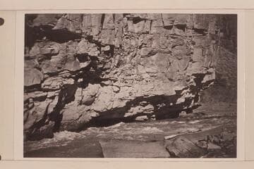 Buzz Holmstrom's boat in portage at Lower Disaster Rapid