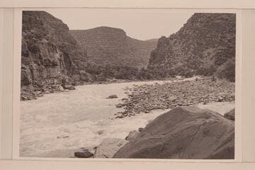 The boulder island in the middle of Disaster Rapid, Canyon of Ladore, Mile 237