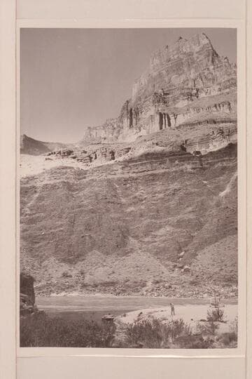 The motorboat "Hudson" and the helicopter at the mouth of Tapeats Creek in Grand Canyon. Joe Desloge stands on the beach