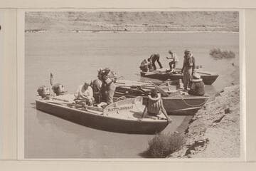 Boats at left shore below the delta and Pierces Ferry where they were met by Bill Belknap; Lake Mead.  On the "Rattlesnake":  Desloge, Sanderson, Cutler.  On the "Bootoo":  Marston, Buzz Belknap.  On the "Cactus":  Beer, Atherton
