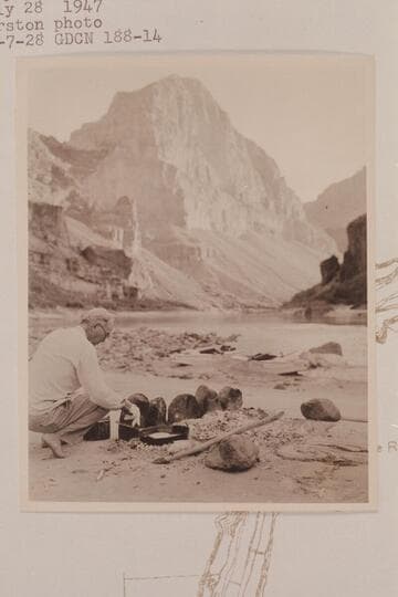Randall Henderson as breakfast chef. Camp at mouth of Whitmore Wash