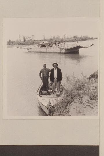 Ed Nichols and Ed Hudson in the 12-ft. outboard "Nancy." Lower Zacatecas Ferry, Colorado River, about 25 miles above Gulf. Photo made on return from run to Gulf