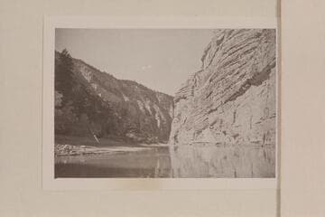 Elwyn Blake piloting a boat through Ashley Falls.  Todd-Page party