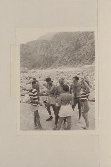 Puzzles at Diamond Creek camp of 1948 Nevills party.  Wright in distance; Nevills; Doerr; Masland; Nancy Streator; Garth Marston; Rosalind Johnson