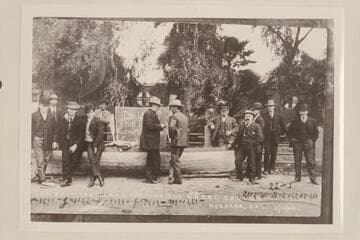 The "Utah" at Needles with Charles Russell at right center explaining how the trip through the Grand Canyon had been accomplished.  Ed Monett is third from right