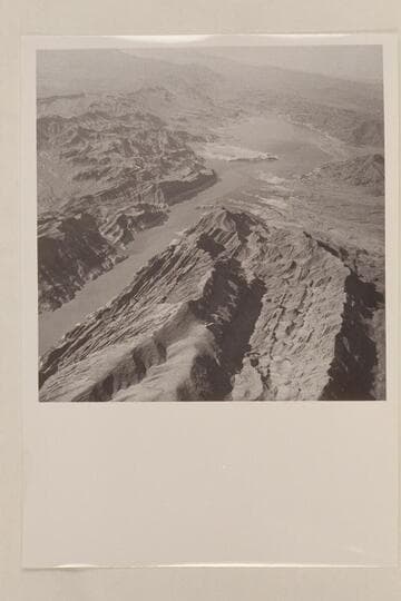 Looking down Lake Mead to right of Iceberg Canyon. Sandy Point in middle distance. The silt shows in the water down past Sandy Point