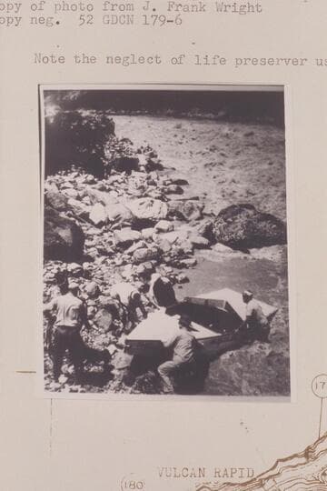 Wright-Rigg crew portaging at Vulcan Rapid, Note the neglect of life preserver use