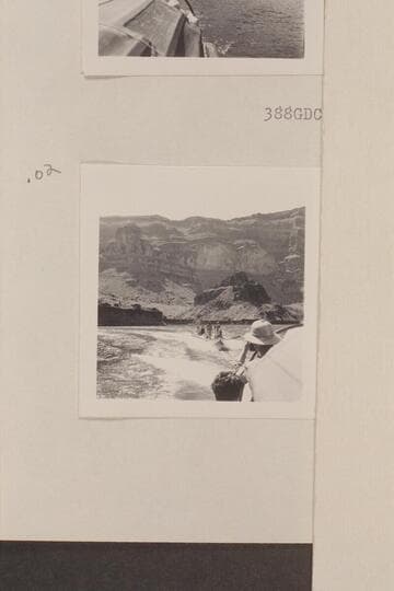 Nevills boats under tow and the crews standing in them for photos. Approximately the Grand Wash Cliffs on Lake Mead