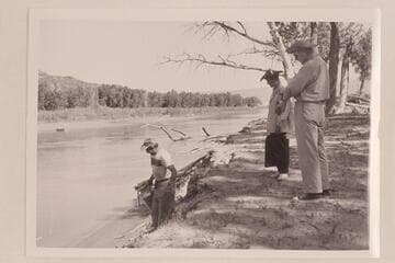Margaret Marston and Joe Desloge watch Lug Larsen; Carrs Landing, Brown's Hole, Green River