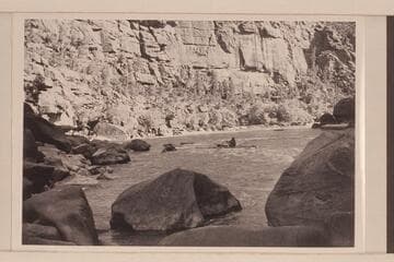 Lug Larsen pulls out of lower end of Triplet Rapids. Low water