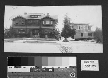 View of house being transported on blocks