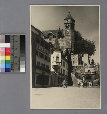 Edwin Powell Hubble and Grace Burke Hubble walking towards the Polish Museum Castle, near Lake Zurich, in Switzerland