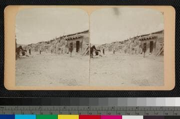 Street in Pueblo of Acoma, New Mexico. George Wharton James is figure at left