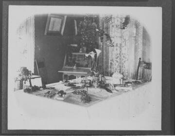 A dining room table set for dinner at superintendent's house at Mill Creek #1 Hydro Plant.  Related to S-