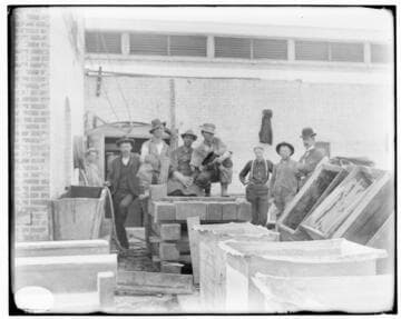 The construction crew posing for the photograph during the construction of either the Fourth Street General Office Building or Los Angeles #2 Steam Plant