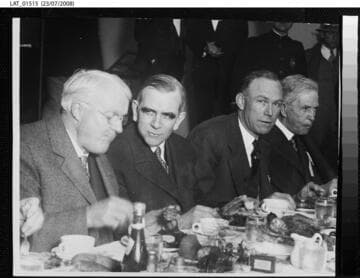 Harry Chandler dining with others