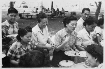 Nowland and Mabel Hong at a group picnic