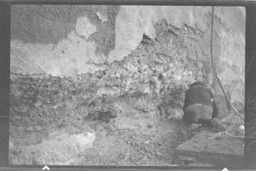 Dam 1. Area near station 5-66, elevation 6904 Chipping in progress