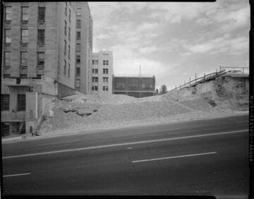 Excavation for expansion of parking lot next to Edison General Office after demolition of Apartment Building