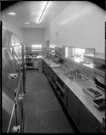 Behind the counter in a cafeteria