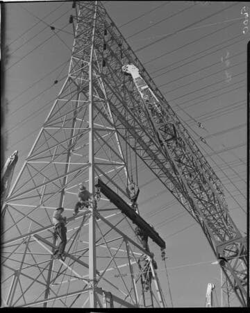 Construction work raising 12 circuit towers out of Eagle Rock Substation