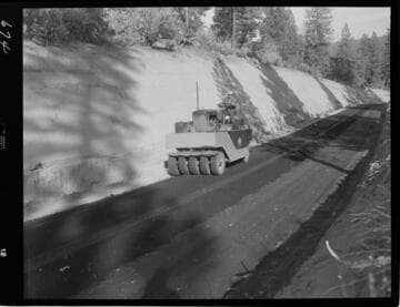 Big Creek - Mammoth Pool - Rolling road paving on Chiquito Creek access road