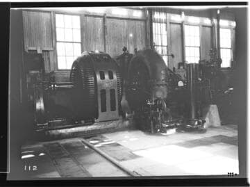 An interior view of Kaweah #2 Power House showing the waterwheels