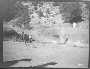 A man working on the foundation for the power house at Tule Plant