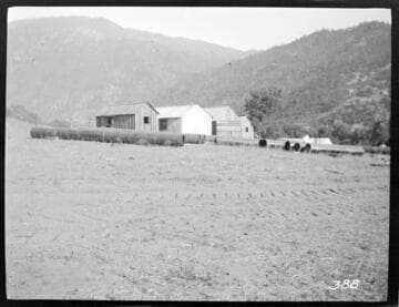 The construction camp for Tule Plant with pipes in front of the buildings