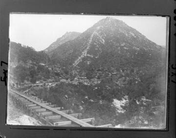 The flume at Tule Hydro Plant where it leaves the P.G. & E. power house at Wishon Forks. At that time