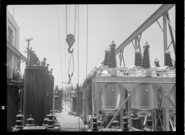 Transformers and oil circuit-breakers on loading dock