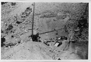Copies of old construction photos at Lundy Dam