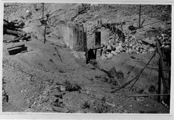 Copies of old construction photos at Lundy Dam