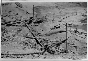Copies of old construction photos at Lundy Dam