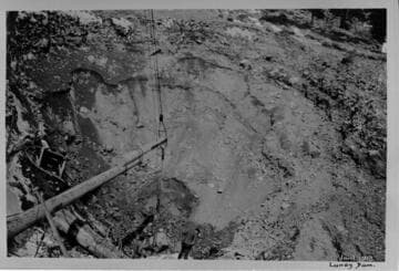 Copies of old construction photos at Lundy Dam