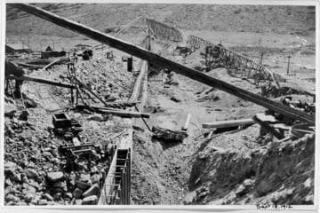 Copies of old construction photos at Lundy Dam