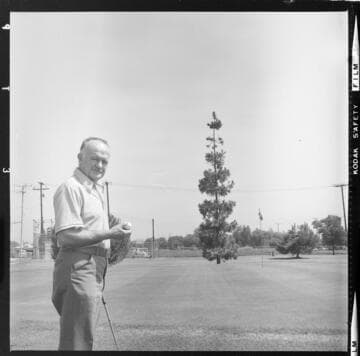 Golfer and men working on Central Division Supply Center Study