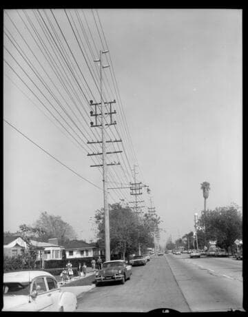 Pole configuration in a shared transmission/distribution corridor