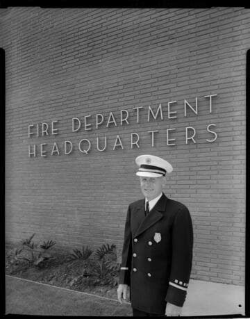 Fire Chief standing in front of Fire Dept. Headquarters