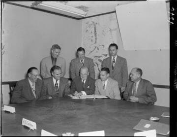 Edison executives at the board room table