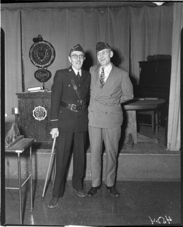 Two men in uniform at Edison American Legion meeting